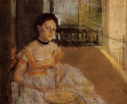Frau auf Balkon Sitz