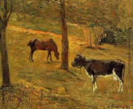 Pferd und Kuh auf einer Wiese