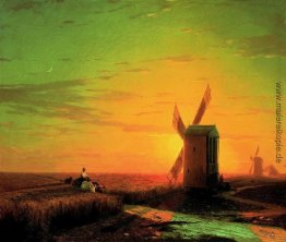 Windmühlen in der ukrainischen Steppe bei Sonnenuntergang