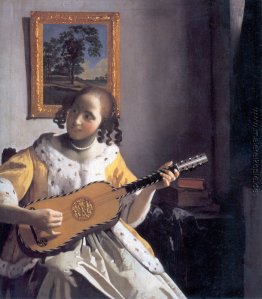 Youg Frau spielt eine Gitarre