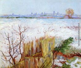 Verschneite Landschaft mit Arles im Hintergrund