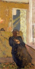 In Schwarz Sitzende Frau gekleidet In Schwarz Sitzende Frau gekleidet