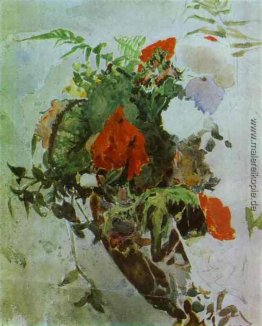 Rote Blumen und Blätter von Begonia in einem Korb