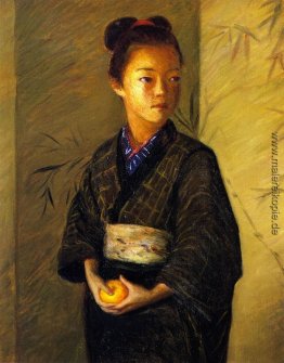 Porträt eines jungen Mädchen mit einer Orange