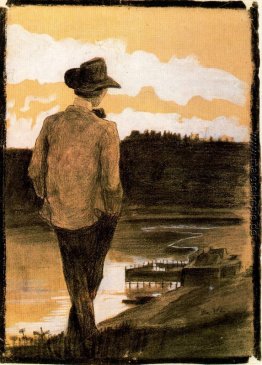 Junger Mann auf einem Flussufer