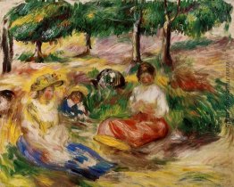 Drei junge Mädchen, die im Gras sitzt