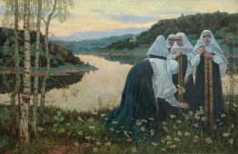 Mädchen auf der Bank des Flusses
