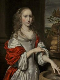 Porträt eines jungen Mädchen, das nahe einem Brunnen