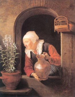 Alte Frau Blumen gießen Alte Frau Blumen gießen