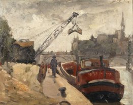 Lasten mit einem Kran Lastkahn auf der Seine Lasten mit einem Kran Lastkahn auf der Seine