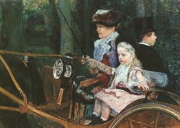 Eine Frau und Kind auf dem Fahrersitz Eine Frau und Kind auf dem Fahrersitz