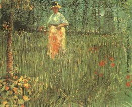 Eine Frau, die im Garten Eine Frau, die im Garten