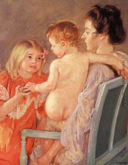Sara Übergebung eines Spielzeug an die Baby- Sara Übergebung eines Spielzeug an die Baby-