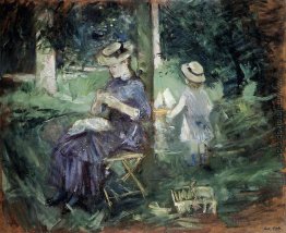 Frau mit Kind in einem Garten Frau mit Kind in einem Garten