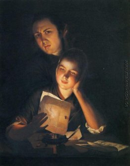 Ein Mädchen, die einen Brief durch Kerzenlicht, mit einem jungen Ein Mädchen, die einen Brief durch Kerzenlicht, mit einem jungen