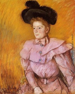 Frau in einem schwarzen Hut und einem Himbeerrosa Kostüm Frau in einem schwarzen Hut und einem Himbeerrosa Kostüm