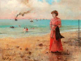 Junge Frau mit dem roten Regenschirm am Meer Junge Frau mit dem roten Regenschirm am Meer