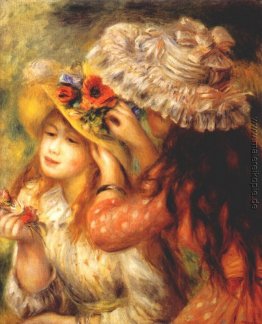 Mädchen Putting Blumen auf ihre Hüte Mädchen Putting Blumen auf ihre Hüte
