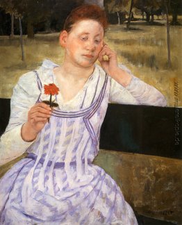 Frau mit einer roten Zinnia Frau mit einer roten Zinnia