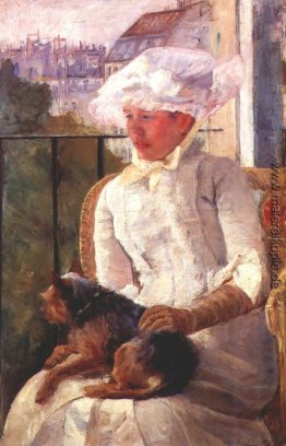 Susan auf einem Balkon mit einem Hund Susan auf einem Balkon mit einem Hund