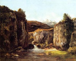 Die Quelle zwischen den Felsen des Doubs Die Quelle zwischen den Felsen des Doubs