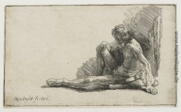 Nude Mann mit einem Bein sitzt auf dem Boden verlängert Nude Mann mit einem Bein sitzt auf dem Boden verlängert