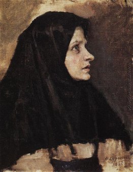 Kopf einer Frau im schwarzen Schal Kopf einer Frau im schwarzen Schal